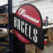 Newly printed signage for Famous Bagels