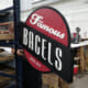 Newly printed signage for Famous Bagels