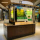 Printed signage for a mall kiosk.