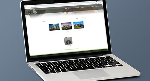 Laptop displaying real estate photos
