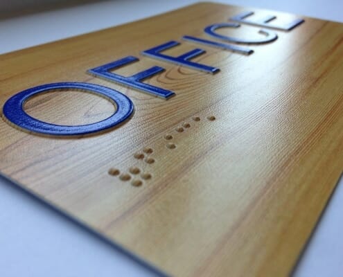 Printed braille office signage