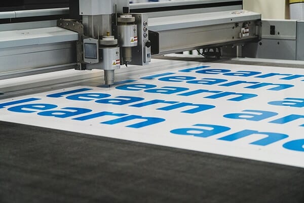 Wide format printer printing a project