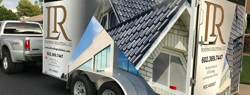 Vehicle graphics on a trailer for LR Roofing
