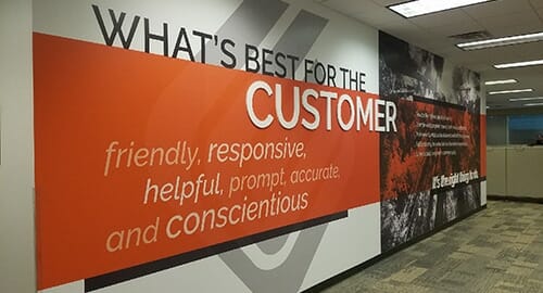 Dimensional interior signage and wall mural installation