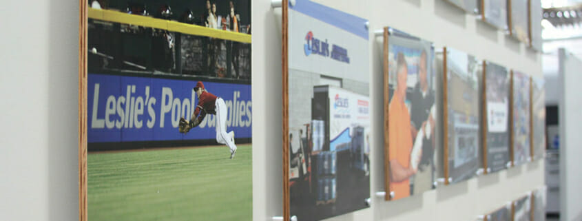 Printed MDO signage standoffs mounted on a wall