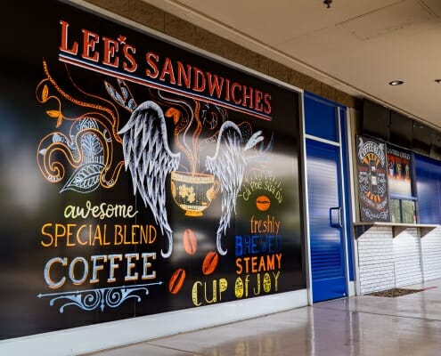 Color printed storefront signage for Lee's Sandwiches