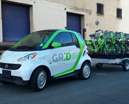 Printed vehicle wraps on GR:D car and bicycles