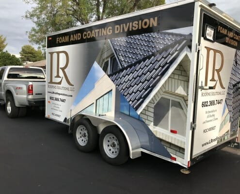 Vehicle graphics on a trailer for LR Roofing