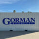 Printed vinyl graphics for Gorman & Company on the side of a shipping container