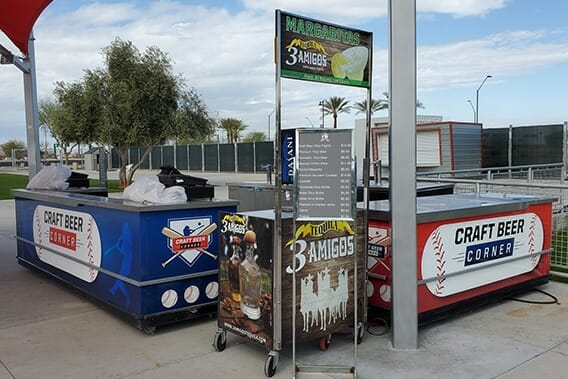 Vendor setup at a baseball park for Craft Beer Corner with printed color display graphics/advertising