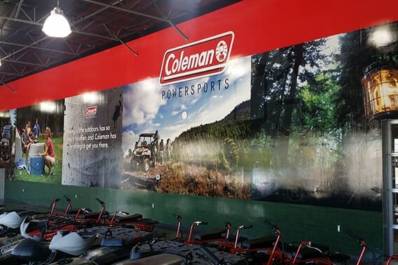 Large wall mural for Coleman Powersports depicting various outdoor scenes