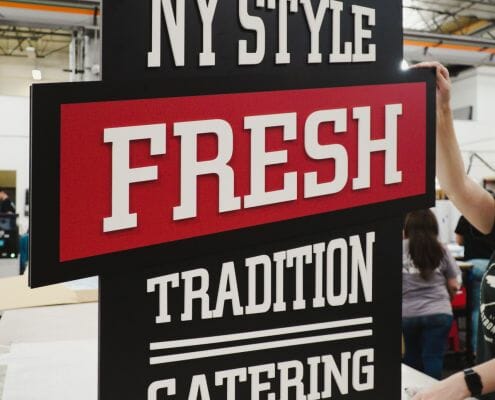 NY Style Fresh Tradition Catering sign