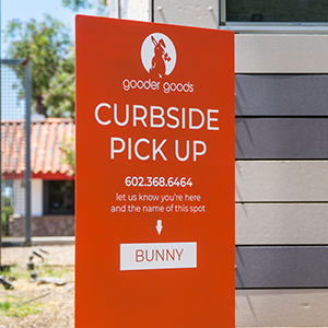 printed aluminum sign for parking lot of gooder goods bunny spot
