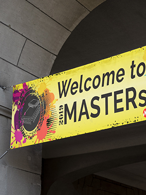 printed vinyl banner hung outside on a cement building event for microchip