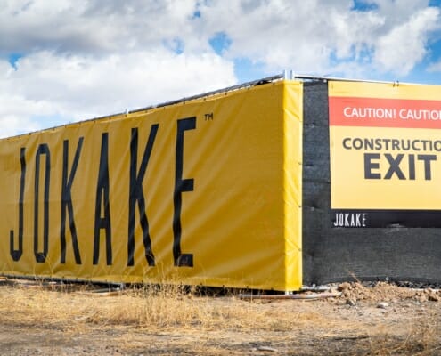 Vinyl fence wrap for Jokake Construction