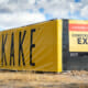 Vinyl fence banner wrap and construction sign for Jokake Construction.