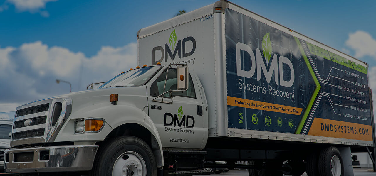 White delivery truck with vinyl graphics.