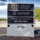 Example of a monument sign panel replacement for a real estate company.