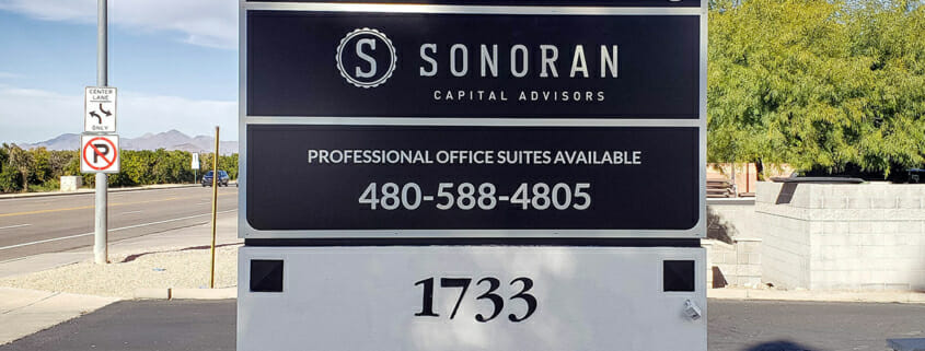 Example of a monument sign panel replacement for a real estate company.