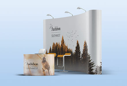 PRI-Signage-Page-Display Curved trade show display and counter display for Audubon Southwest.