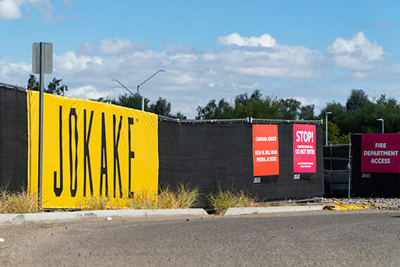 Construction fence wrap banner and signage.