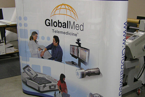 Curved trade show display for telemedicine company.