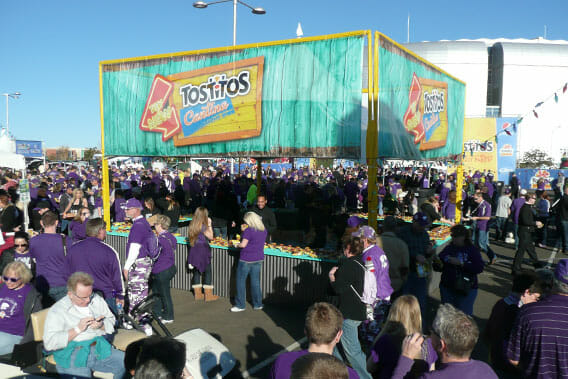 Exterior signage for Tostitos installed at an outdoor event.